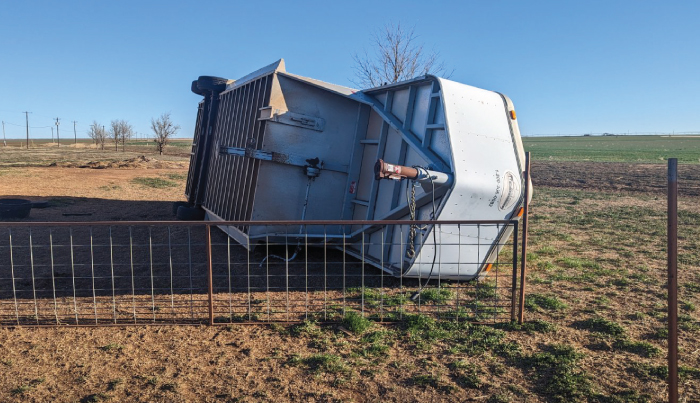 swine trailer on its side